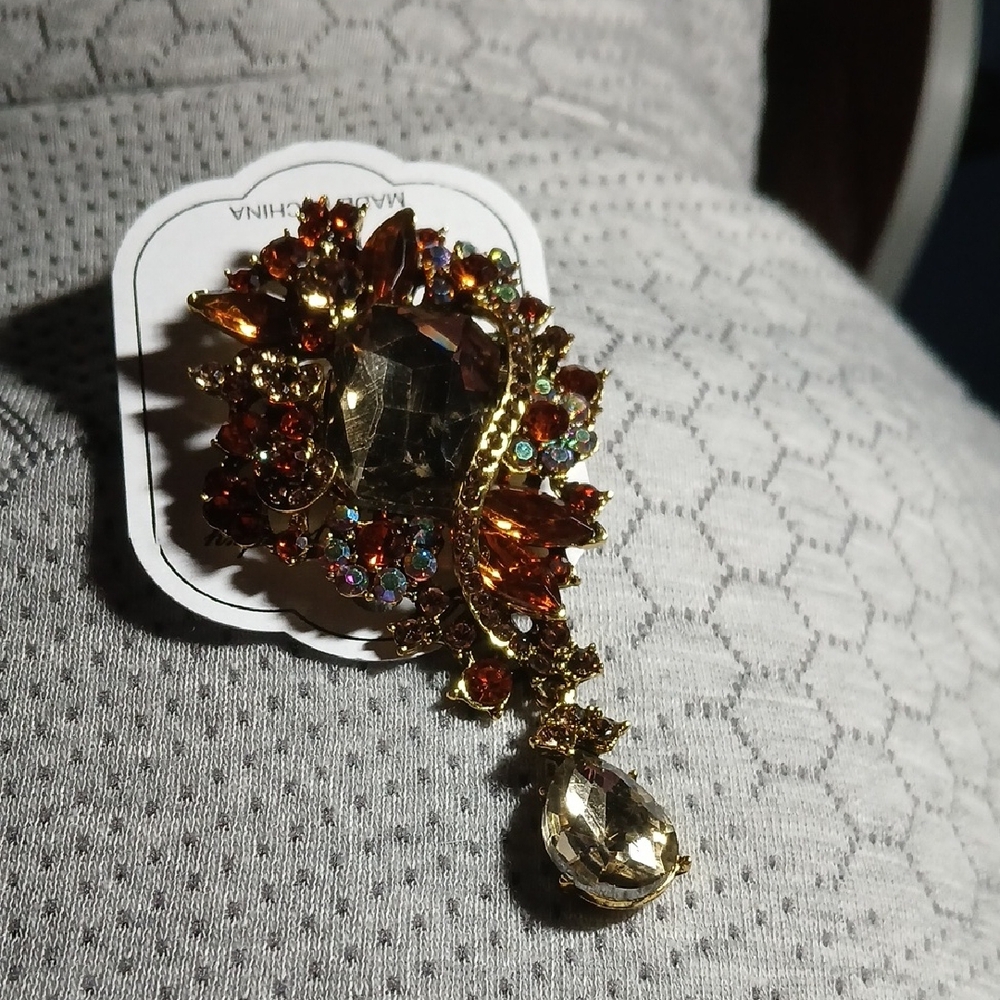 Radiant Gold and Brown Crystal Brooch